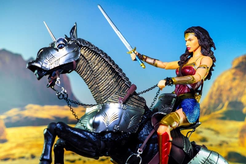 Wonder Woman riding an iron horse