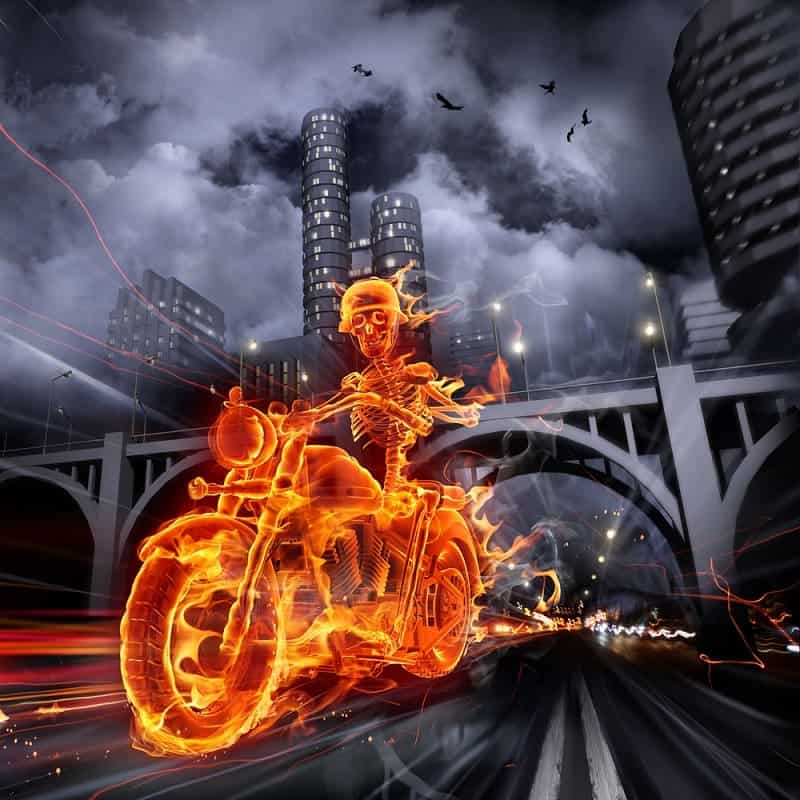 burning Ghost Rider riding a motorcycle