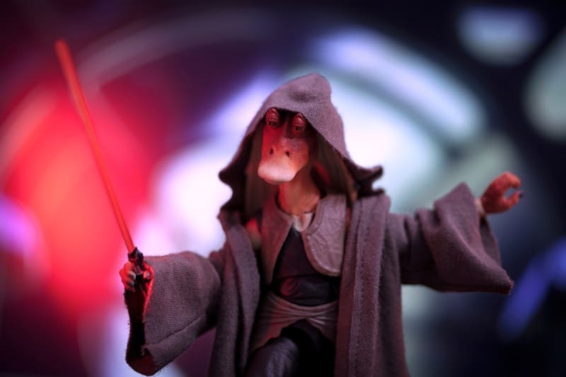 Darth Jar Jar Binks holding a red lightsaber