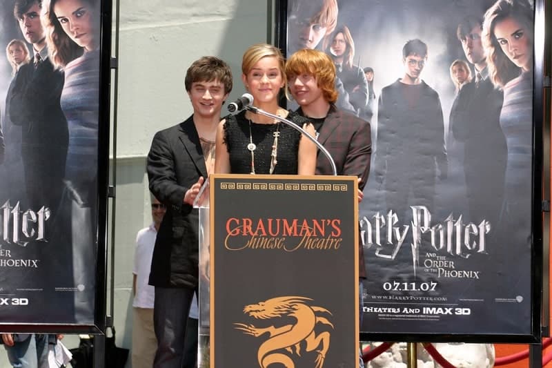 Rupert Grint, Daniel Radcliffe, and Emma Watson Harry Potter HandprintFootprintWandprint Ceremony Grauman's Chinese Theater Los Angeles